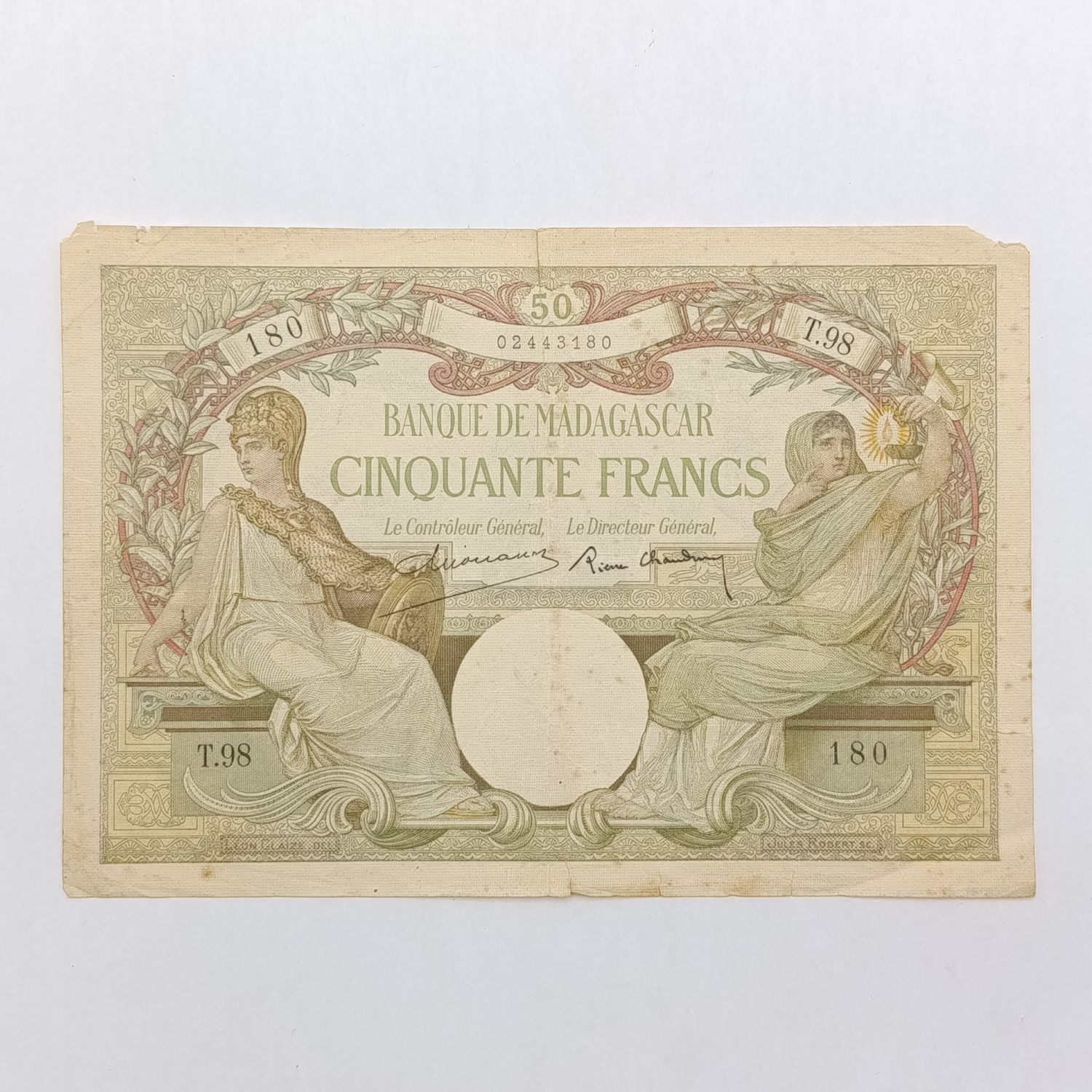 Madagascar 1937 type Dejouany / Chaudin 50 Francs - some rim damage and centre tear at the top