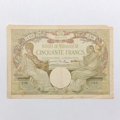 Madagascar 1937 type Dejouany / Chaudin 50 Francs - some rim damage and centre tear at the top