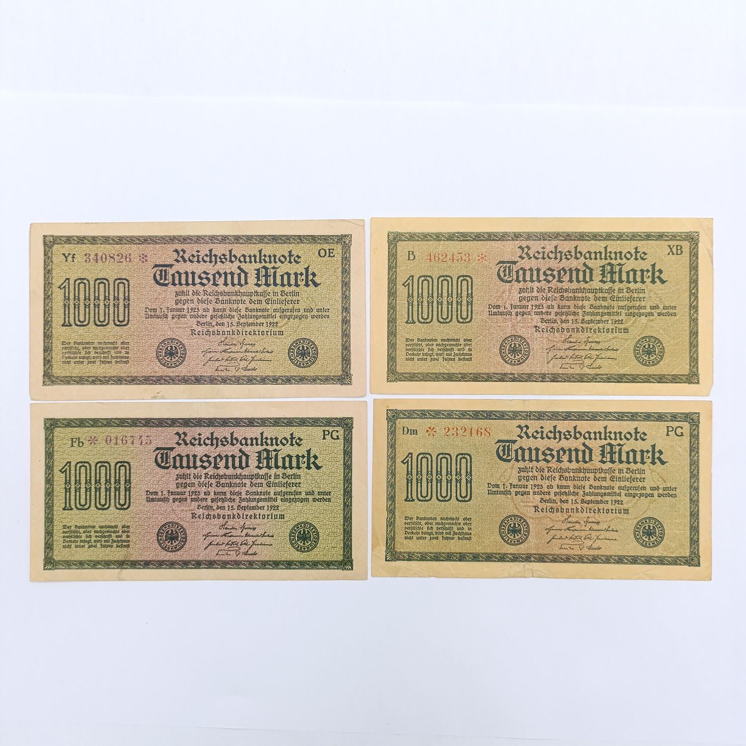 Lot of 4 German 1922 banknotes 1000 mark - red and purple serials with star before and after serial