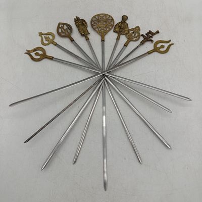 Lot of 9 vintage Turkish skewer sticks with brass tops