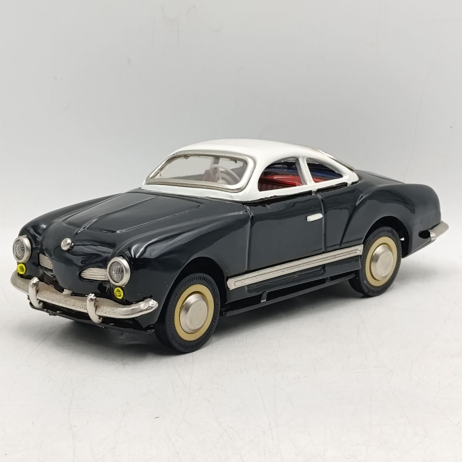 Vintage Chinese tinplate Volkswagen Karmann Ghia friction toy car - scale 1/18