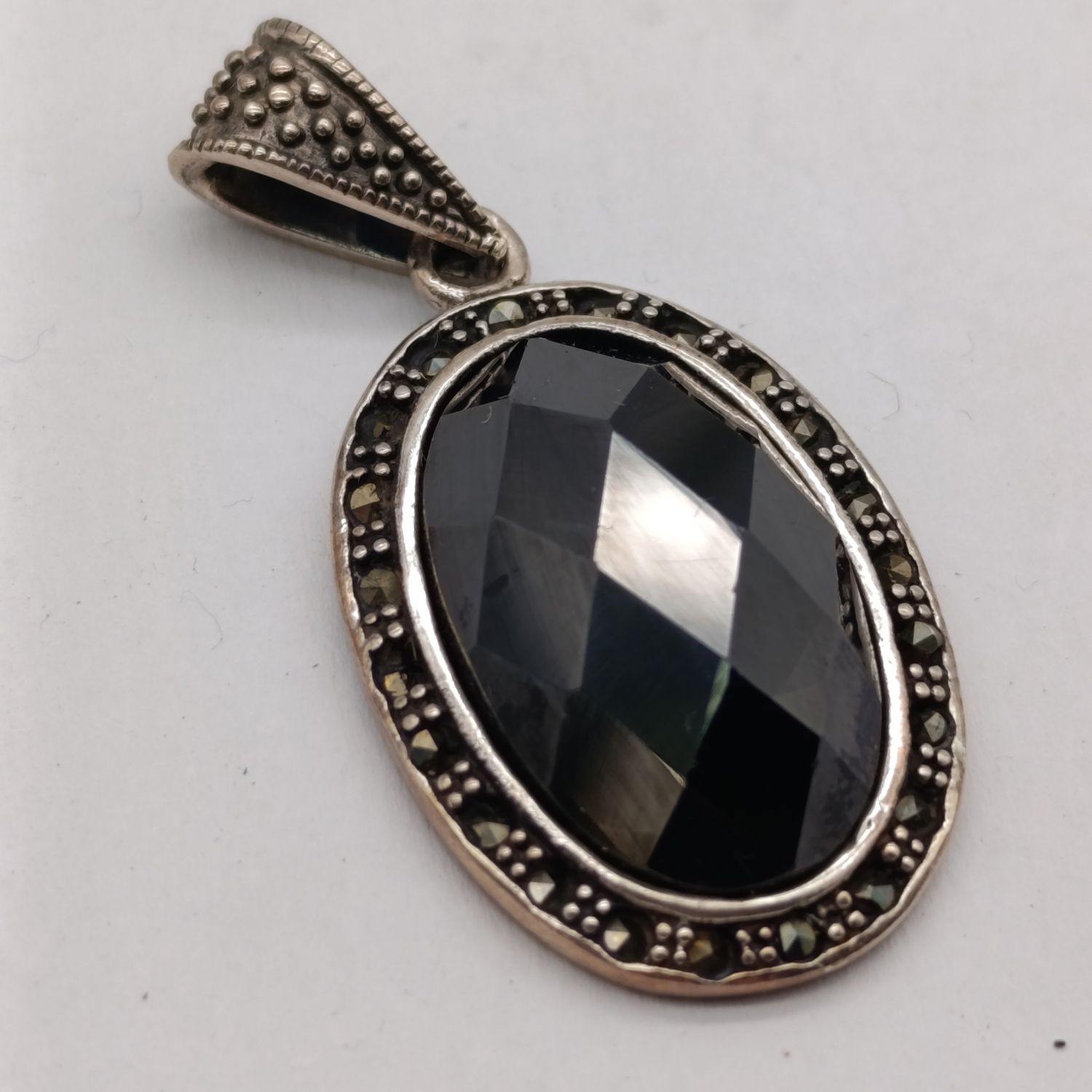 Obsidian Volcanic glass set in sterling silver pendant - weighs 14.3 grams with marcasites