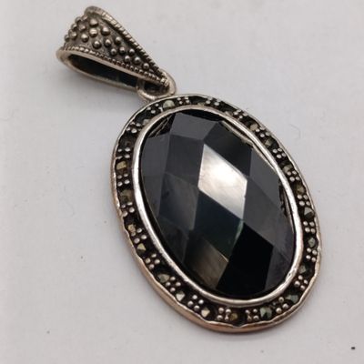 Obsidian Volcanic glass set in sterling silver pendant - weighs 14.3 grams with marcasites