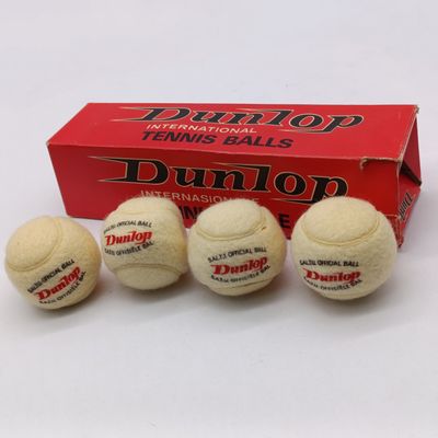 Vintage lot of 4 Dunlop International Tennis balls in original box - rubber hardened