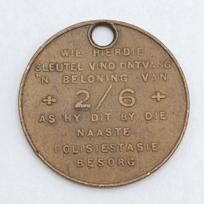 English / Afrikaans Key Token - vintage - Reward for finding key