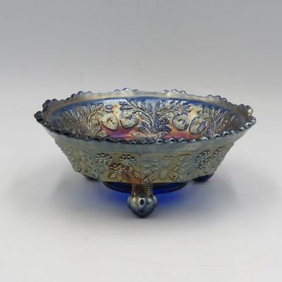 Vintage Carnival glass embossed blue three-legged bowl