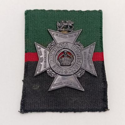 Lot of 4 Rhodesian badges on material backing - possibly from Reuteler set
