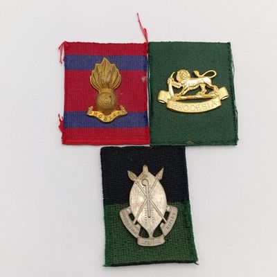 Lot of 3 Rhodesian badges on material backing - possibly from Reuteler set