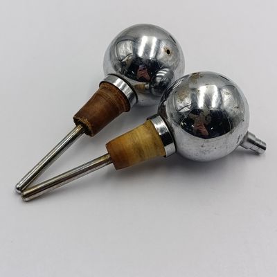 Pair of vintage ball shaped spirit pourers
