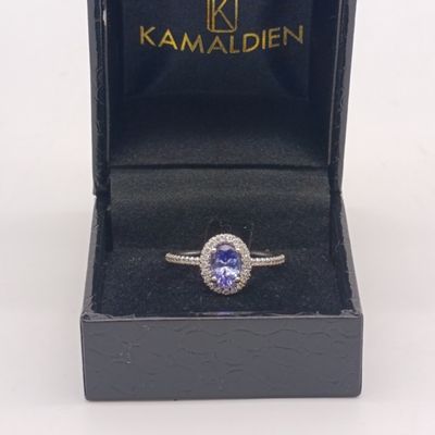 9kt White Gold Tanzanite and Diamond ring - weighs 2.6 grams - size N