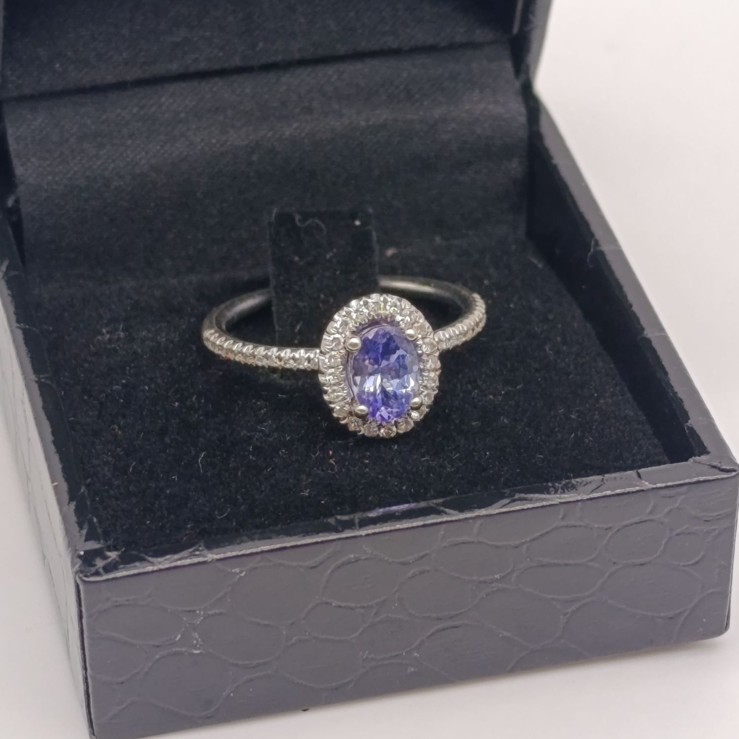 9kt White Gold Tanzanite and Diamond ring - weighs 2.6 grams - size N