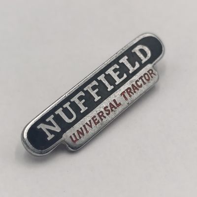 Nuffield universal tractor pin badge