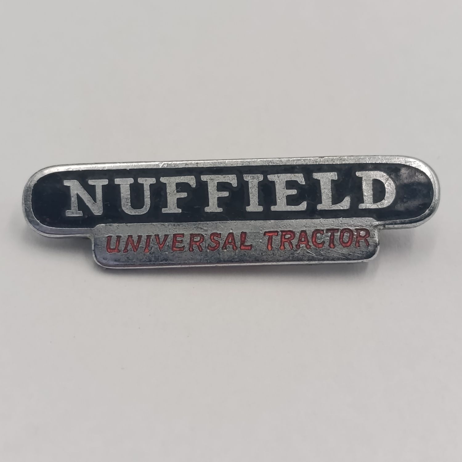 Nuffield universal tractor pin badge
