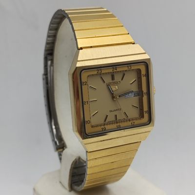 Vintage Seiko 5 Quartz mens dress watch - 8C23-5050 - working