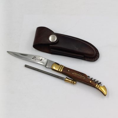 Vintage Laguiole folding pocket knife with sharpening stick in leather pouch