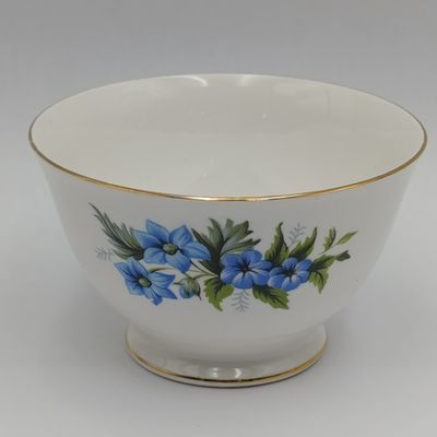 Queen Anne floral design porcelain milk jug and sugar bowl