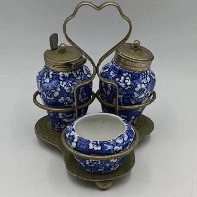 Antique blue and white porcelain condiment set in EPNS stand