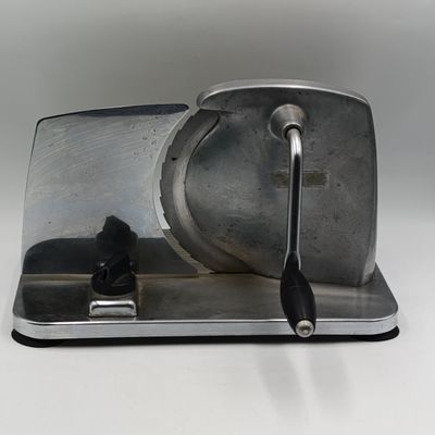 Vintage hand crank bread slicer