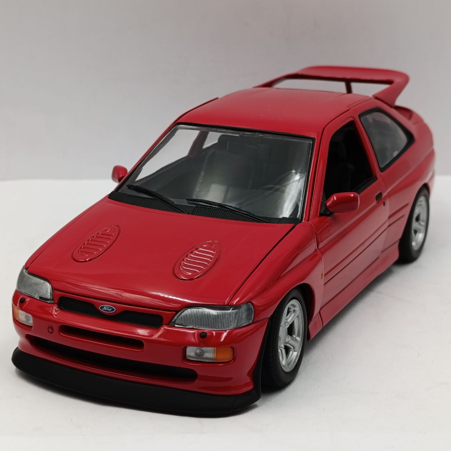 UT Models Ford Escort RS Cosworth radiant red die-cast model car - scale 1/18