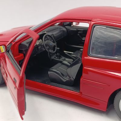 UT Models Ford Escort RS Cosworth radiant red die-cast model car - scale 1/18