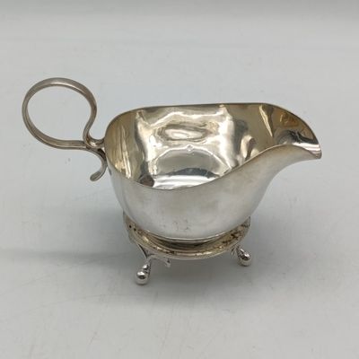 Silverplated sauce boat with stand