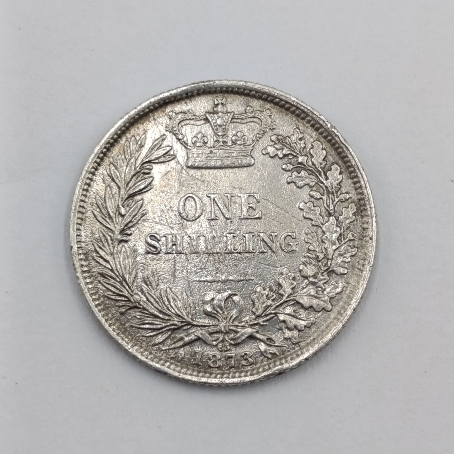 1873 British shilling Die no 63 - VF scratched