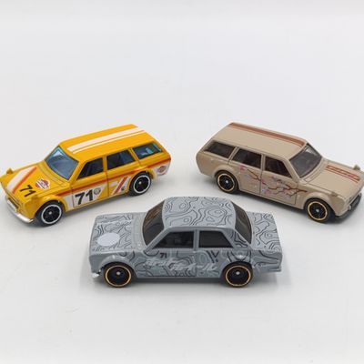Lot of 3 Hot Wheels Datsun die-cast toy cars