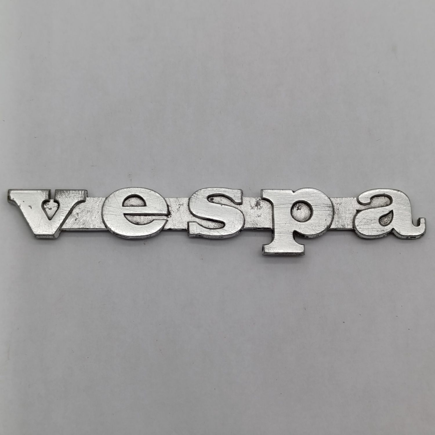 Vintage Vespa aluminum badge