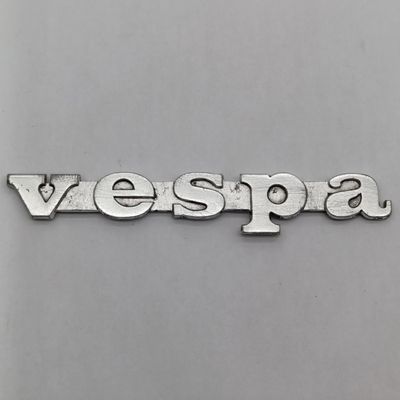 Vintage Vespa aluminum badge