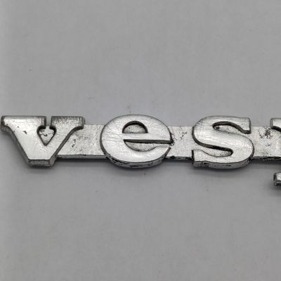 Vintage Vespa aluminum badge