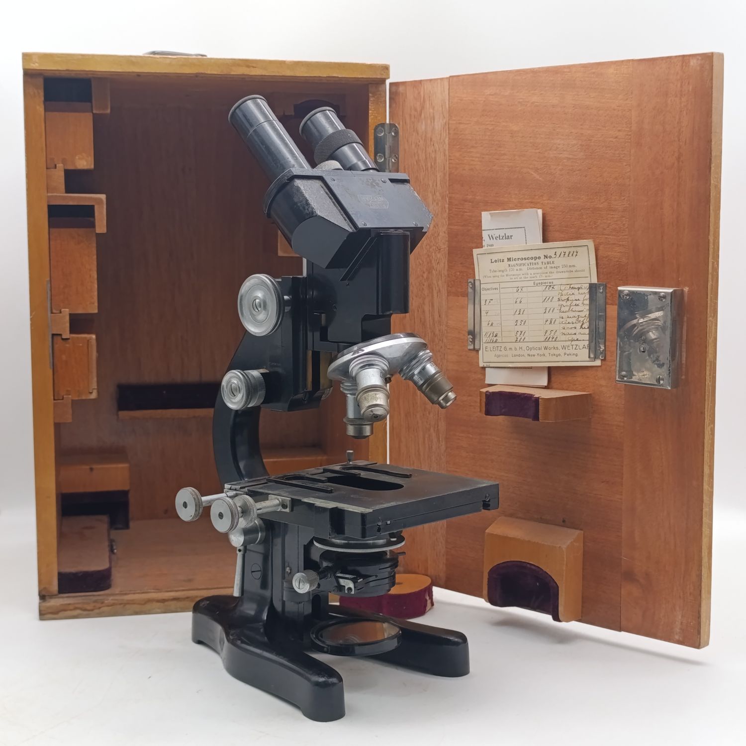 Vintage E'Leitz Wetzlar micropscope with extra lenses and filters ion original wooden carry box