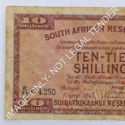 South Africa J Postmus 1945 Ten Shillings banknote - small bottom tear - still a nice note
