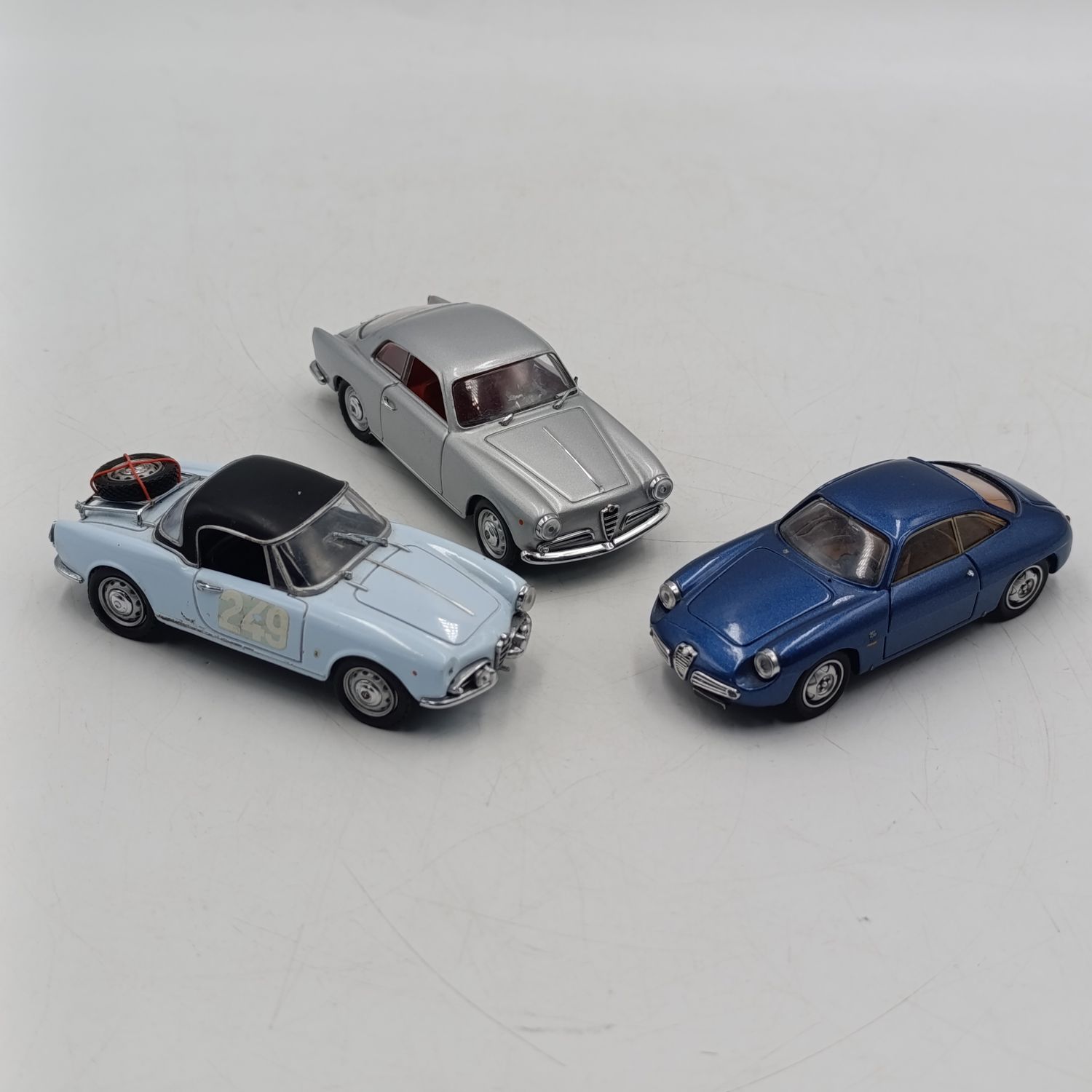 Lot of 3 Alfa Romeo die-cast model cars - Scale 1/43 - some small pieces damage