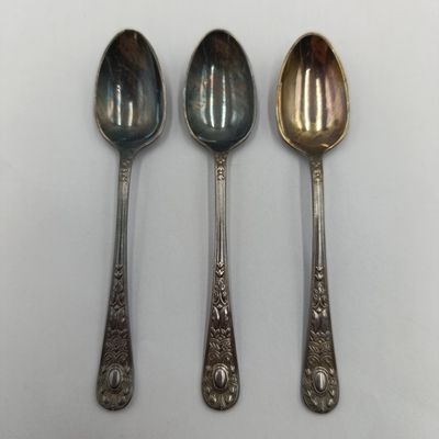 Vintage set of teaspoons with sugar tongs in case