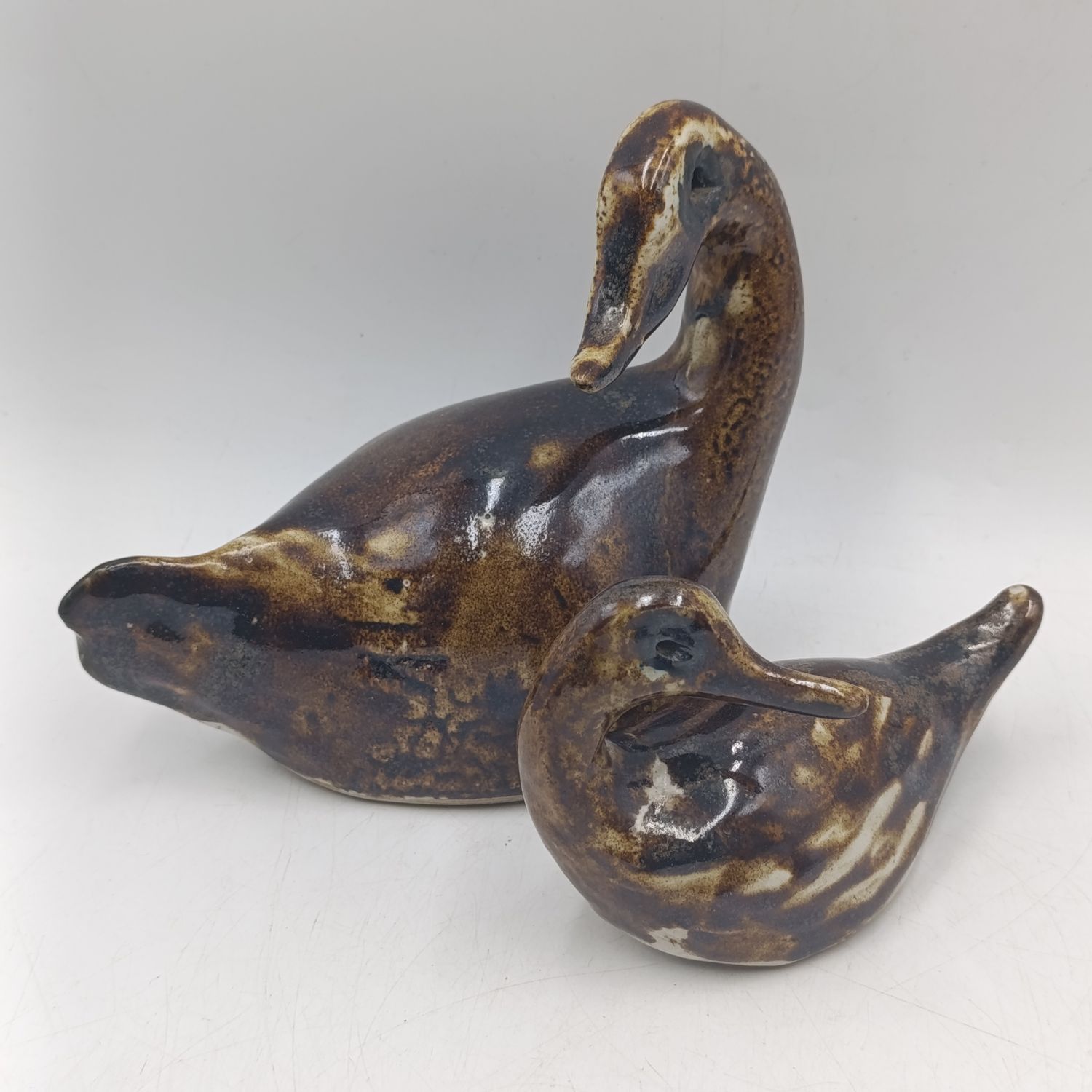Pair of ceramic ducks with mottled tortoiseshell glaze - 1960's