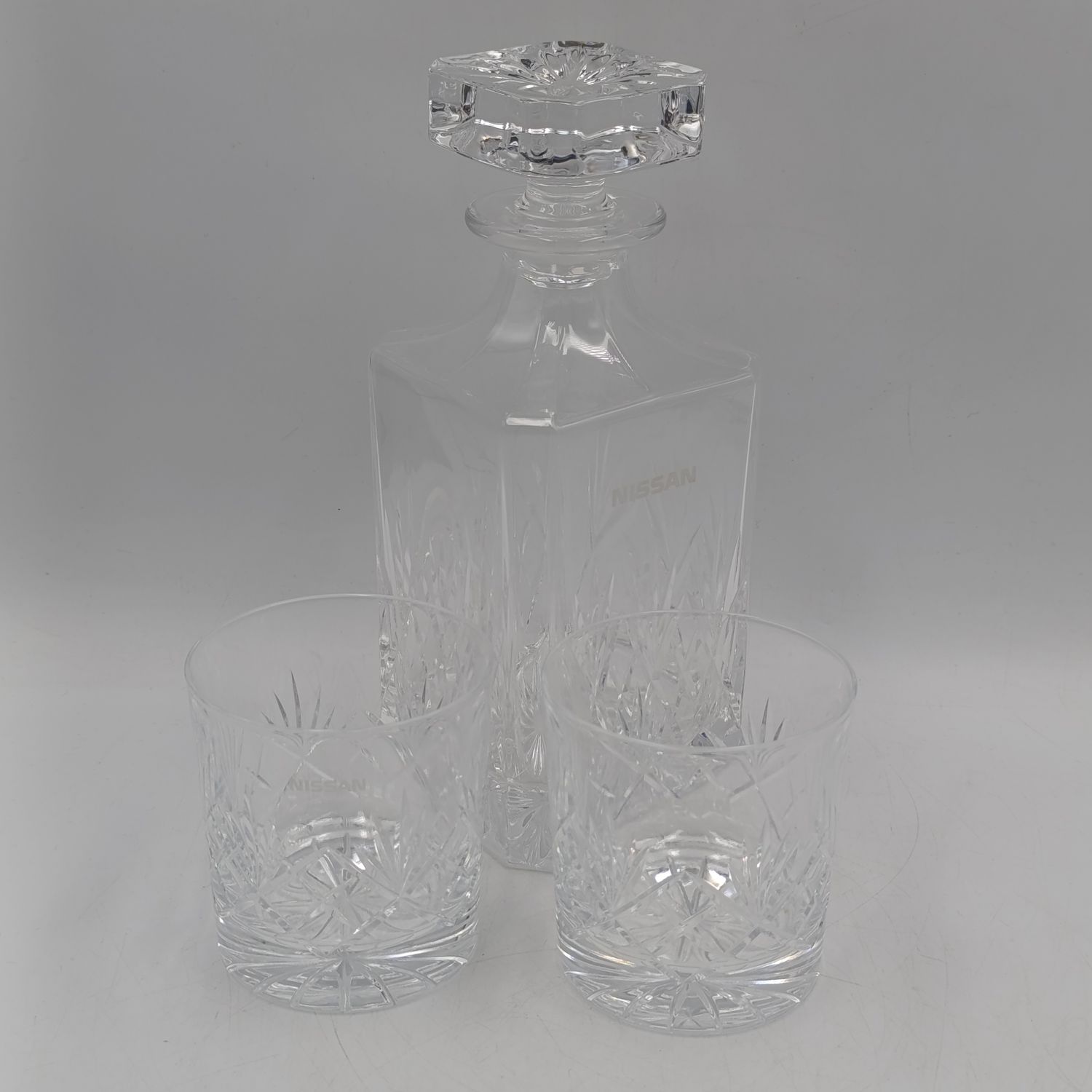 Longchamp pattern crystal decanter and 2 glasses - branded Nissan whiskey set