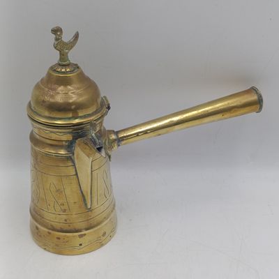 Pair of middle Eastern brass Dallah coffee pots