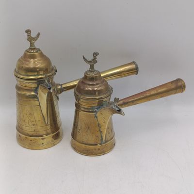 Pair of middle Eastern brass Dallah coffee pots