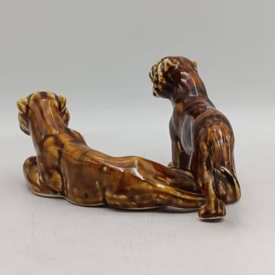 Pair of vintage ceramic tiger figurines
