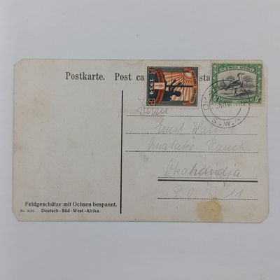 1934 German South West Africa Postcard with 1/2d (half penny) stamp extra 1934 Chistmas stamp posted in Okahandja - Picture of oxen and oxwagen