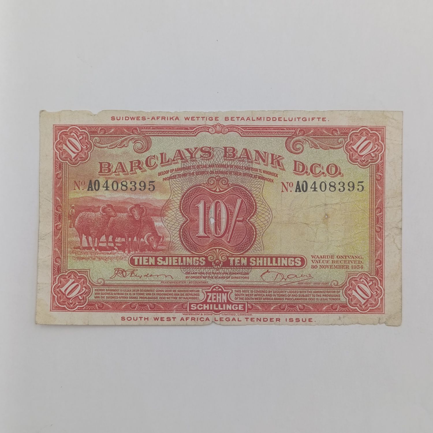 South West Africa Barclays 10 Shillings banknote - center hole and some damage