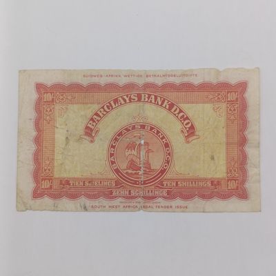 South West Africa Barclays 10 Shillings banknote - center hole and some damage