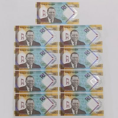 Lot of 9 Namibia NAM$60 uncirculated banknotes with consecutive numbers