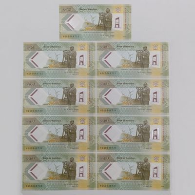 Lot of 9 Namibia NAM$60 uncirculated banknotes with consecutive numbers
