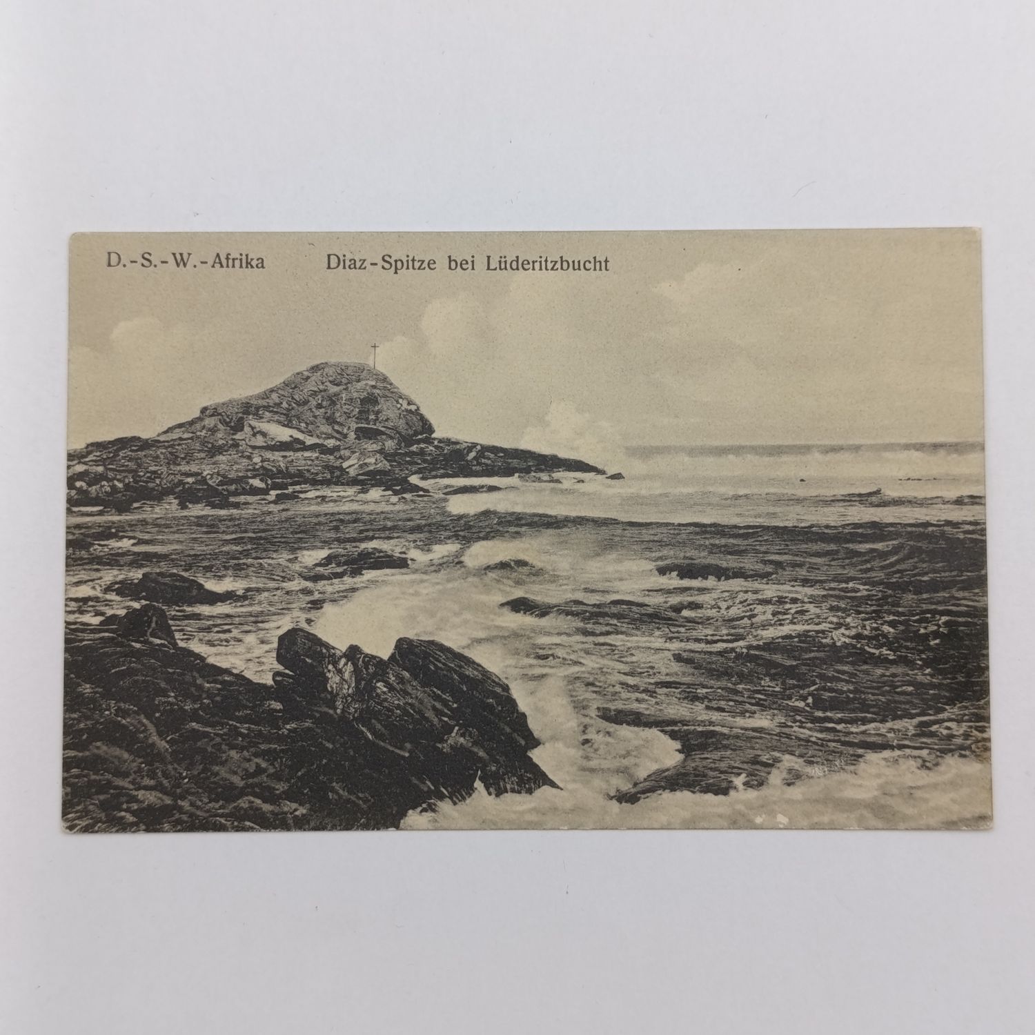 Postcard with the Cross of Diaz at Luderitz - Posted 10 Jan 1912 at Luderitz with 5 Pf Keiser Yacht stamp to USAKOS - greetings from the Diamond Desert