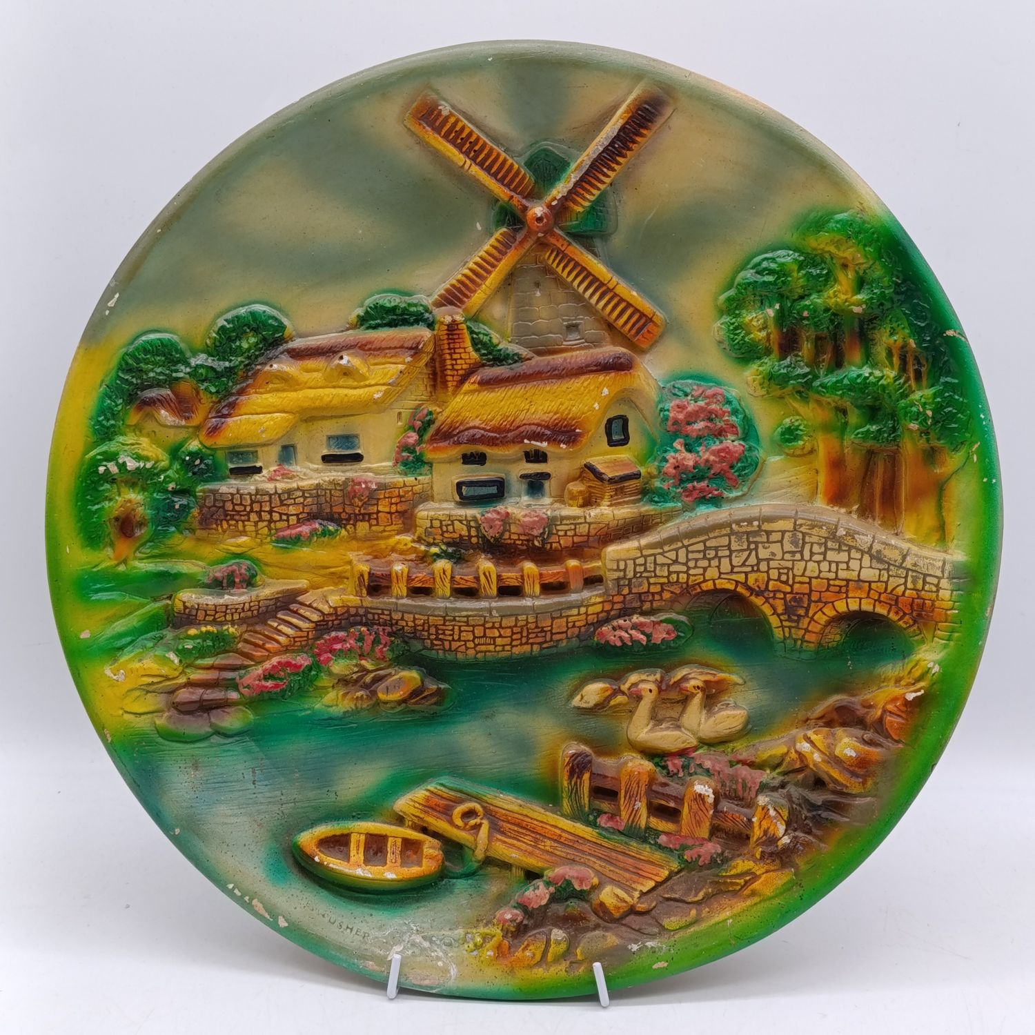 Vintage Dutch themed plaster wall plate - by E Wusher - chipped repaired