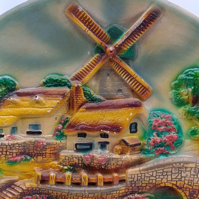 Vintage Dutch themed plaster wall plate - by E Wusher - chipped repaired