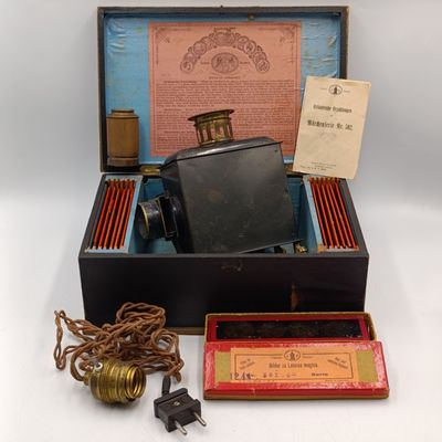 Antique Ernst Planck Fairy tales magic lantern in case with glass fairy tale slides