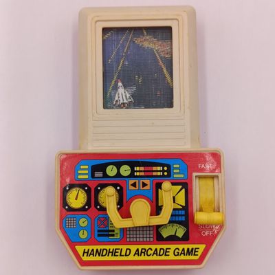 Vintage 1990 Hand-held arcade game - working