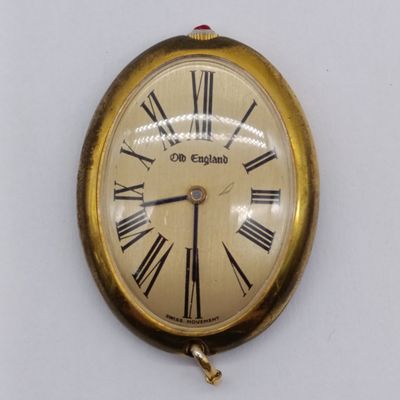 Vintage old England Oval mechanical pendant watch in gold tone case - Swiss movement - late 1960's